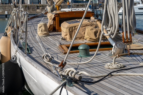 close up view of the rigging on an old classic wooden sailboat