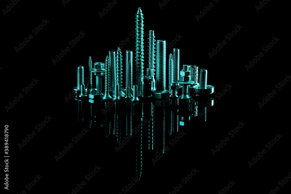 Advertising photo of self-tapping screws and bolts. A lot of sharp screws on a dark background in the form of a night city.