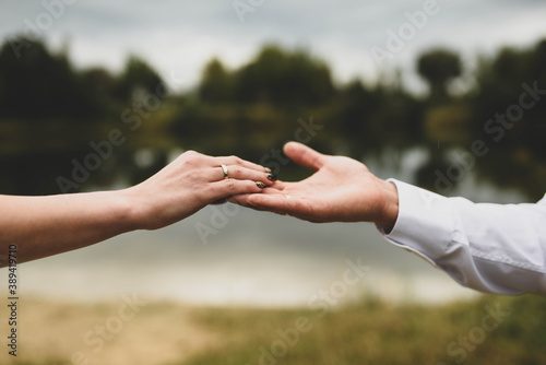 couple holding hands together © ukasz