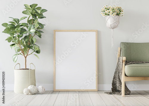 Interior poster mockup with vertical wooden frame decorated with big green plant in woven planter and hanging pot with white flowers. Modern green chair with blanket. 3D rendering.