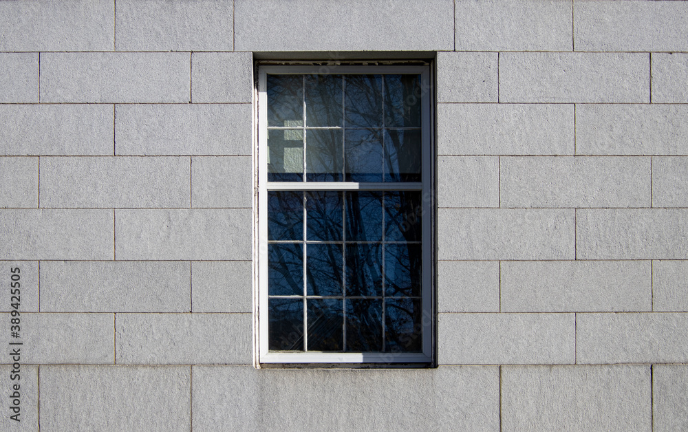 Window in granite block wall