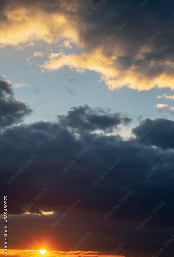 Dramatic sky with clouds on the sunset . Summer background.