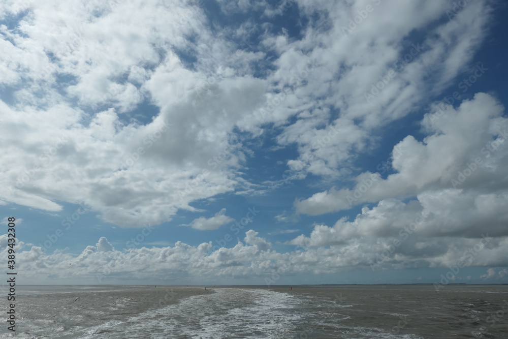A beautiful cloudy sky over the Dutch Wadden Sea.