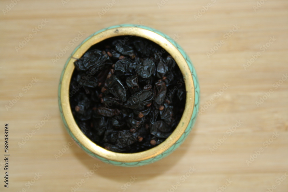 Barberry berries in a ceramic plate. Barberry berries in a ceramic plate.