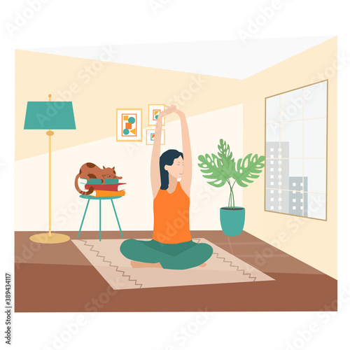 Coronavirus quarantine concept. Young woman in lotus yoga position sitting on the carpet.