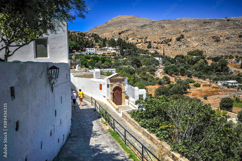 The quarter of the most respectable villas in Lindos is located directly above the harbor on the cliff side of the acropolis of the ancient city of Lind    