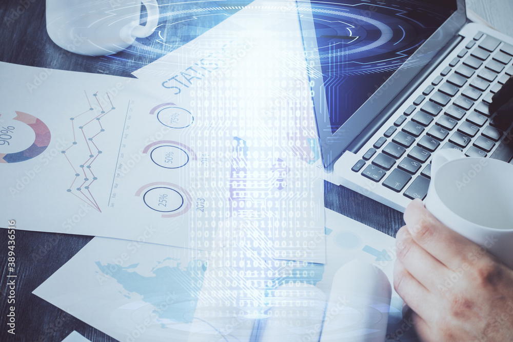 Multi exposure of technology hologram with man working on computer background. Concept of big data. Multi exposure of technology hologram with man working on computer background. Concept of big data.