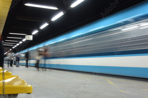Cairo metro station with motion blurred train and passengers - Cairo, Egypt