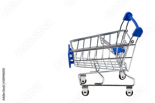 Close up view of empty shopping cart isolated on white background. Shopping concept. © Alex