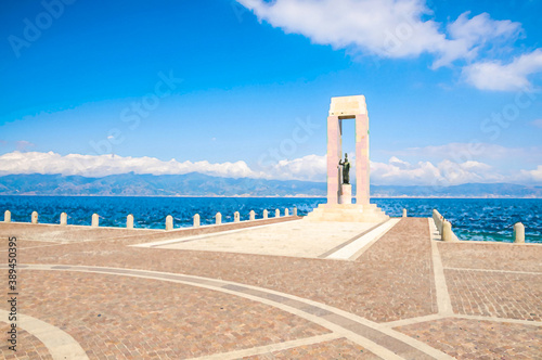 Watercolor drawing of Athena goddess Statue Monument Vittorio Emmanuele on Arena dello Stretto near promenade Lungomare Falcomata with Strait of Messina and Sicilia island, Reggio di Calabria, Italy photo