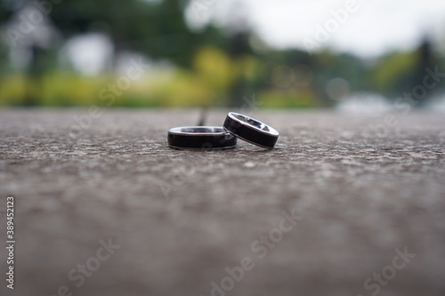 Black romantic couple ring in garden
