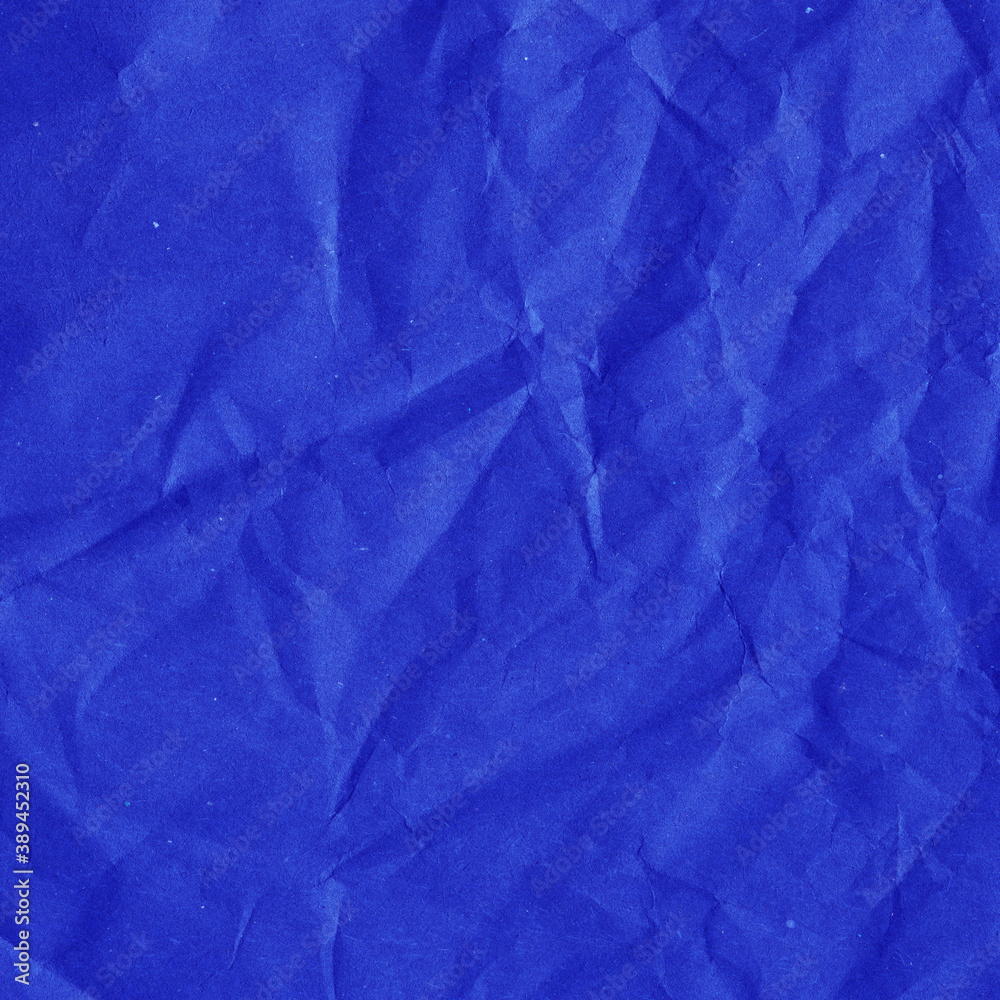 Fototapeta premium Violet vintage and old looking crumpled paper background. Retro cardboard texture. Grunge paper for drawing. Ancient book page. Present wrapping.