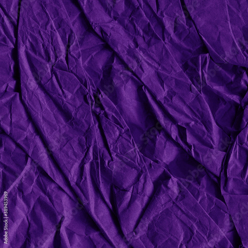Violet vintage and old looking crumpled paper background. Retro cardboard texture. Grunge paper for drawing. Ancient book page. Present wrapping.