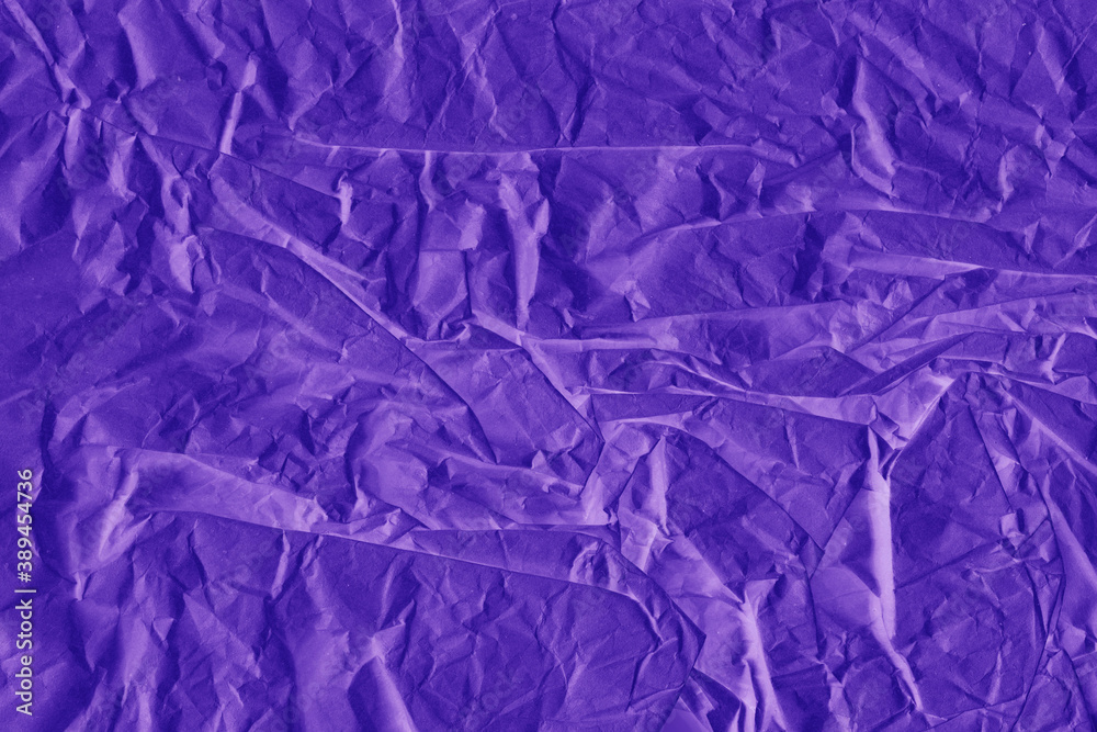 Obraz premium Violet vintage and old looking crumpled paper background. Retro cardboard texture. Grunge paper for drawing. Ancient book page. Present wrapping.