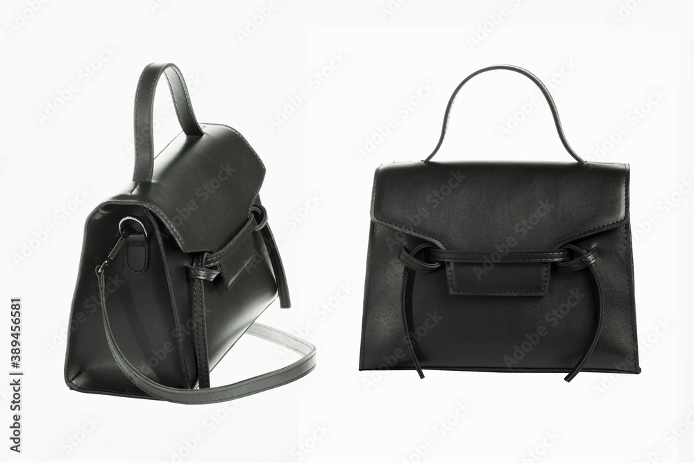 Naklejka premium Black fashion purse handbag on white background isolated