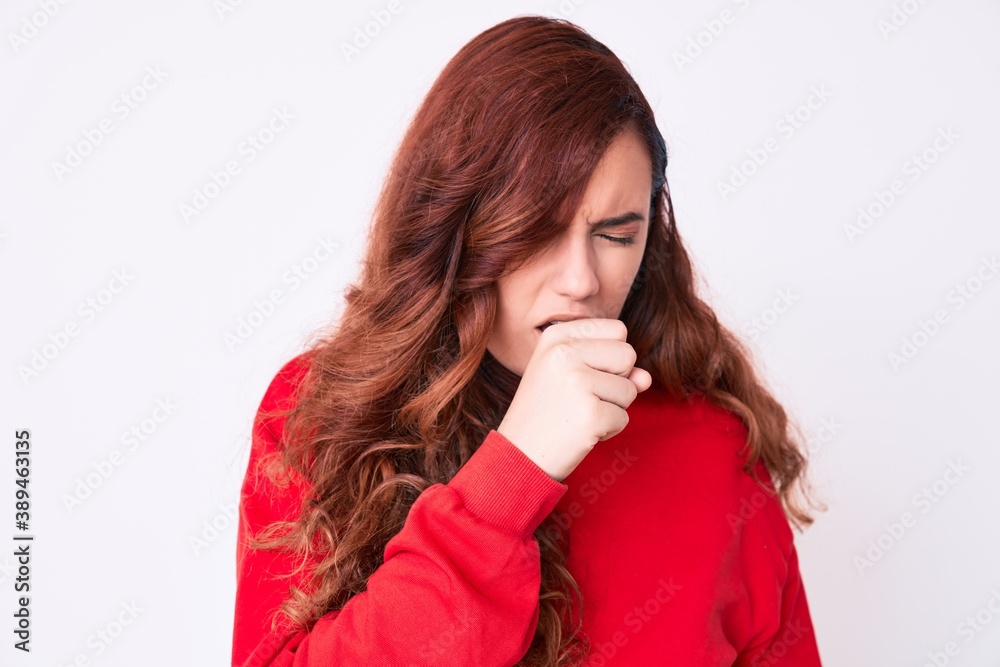 Young beautiful woman wearing casual clothes feeling unwell and coughing as symptom for cold or bronchitis. health care concept. Young beautiful woman wearing casual clothes feeling unwell and coughing as symptom for cold or bronchitis. health care concept.