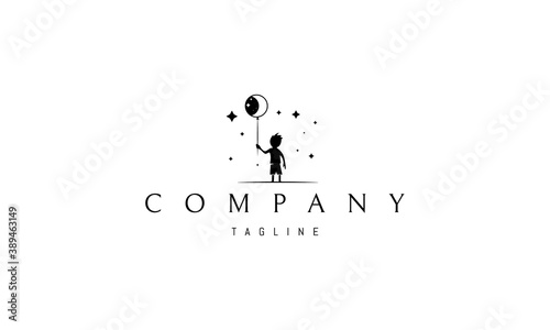 Vector logo in which an abstract image of a child on a background of stars holding a balloon with the moon and stars.
