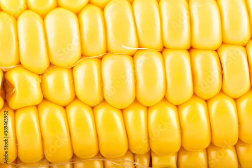 Close-up shot of a peeled ripe corncob.