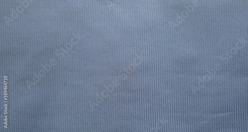 A teak cloth carpet of texture and backgrounds a soft blue vertical line pattern surface style. 