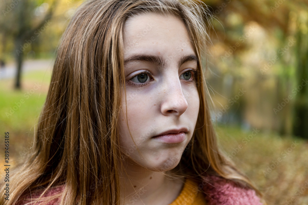 Fototapeta premium Sad looking teenage blonde girl