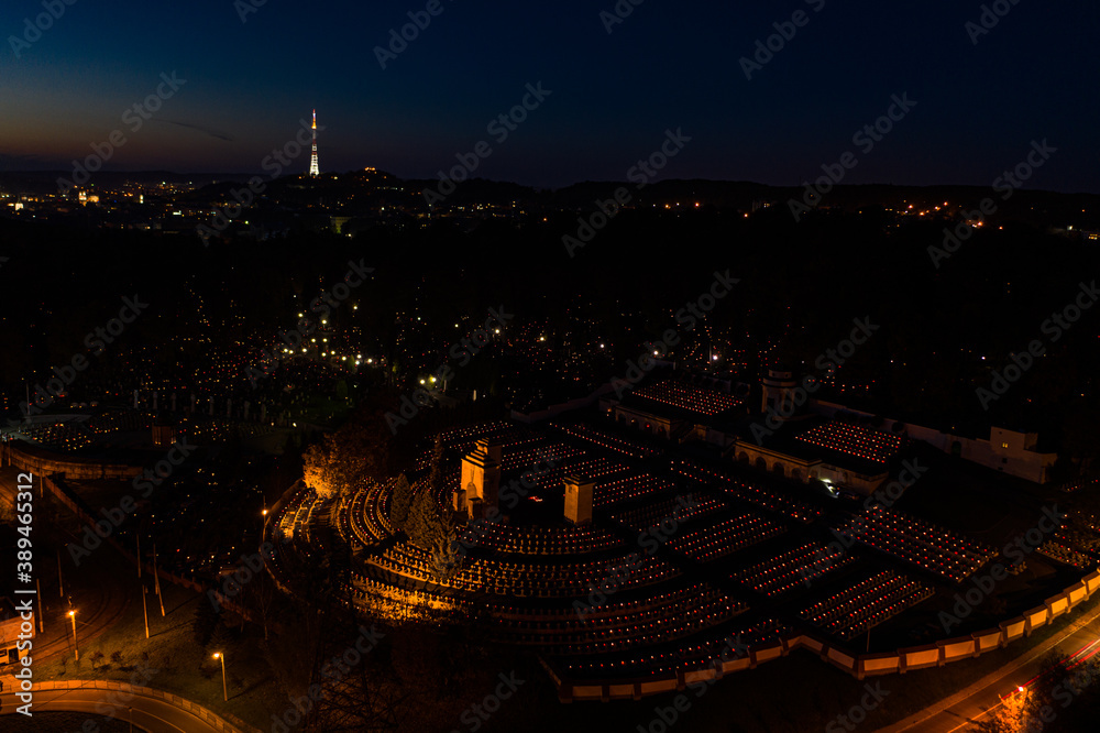 Aerial view on Lychakiv Cemetery State History and Culture Museum-Preserve in Lviv, Ukraine on All Saints' Day at night from drone