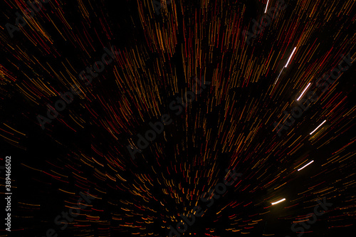 Motion abstract lines or particles on black background. candle light  fireworks