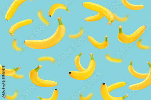 Falling banana on turquoise color background, Minimal creative food concept, selective focus