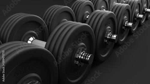 Row of black gym weights.
