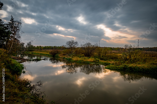 Fototapeta Naklejka Na Ścianę i Meble -  Evening sunset near the river