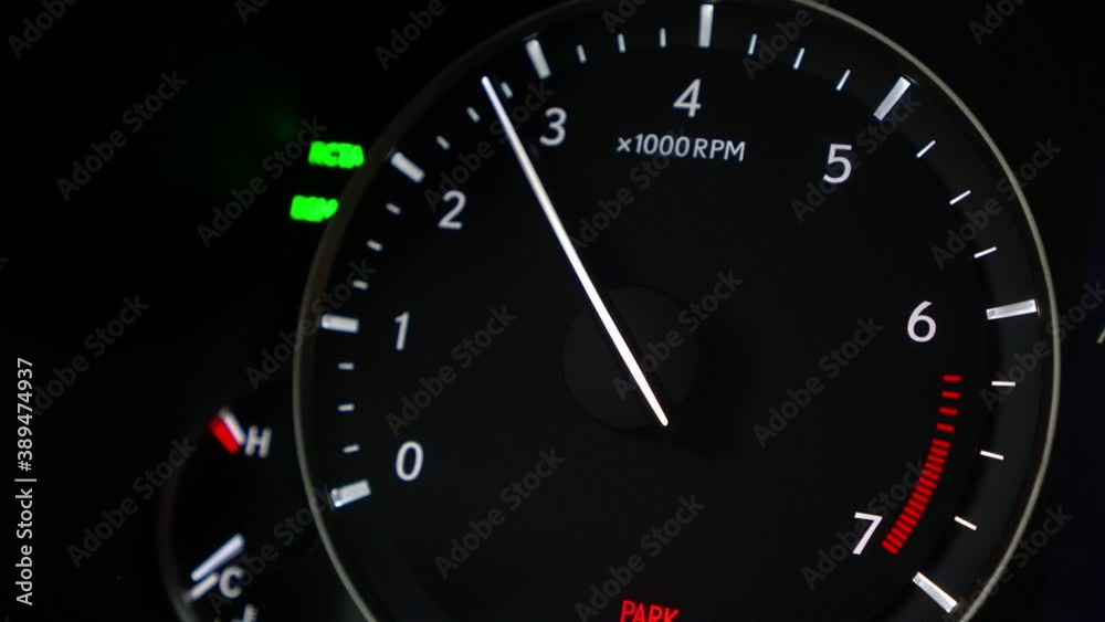 A modern car tachometer close-up shows the engine speed A modern car tachometer close-up shows the engine speed