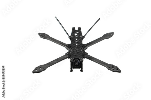 Carbon frame for FPV racing drone isolate on white background. Assembling the quadcopter © solidmaks