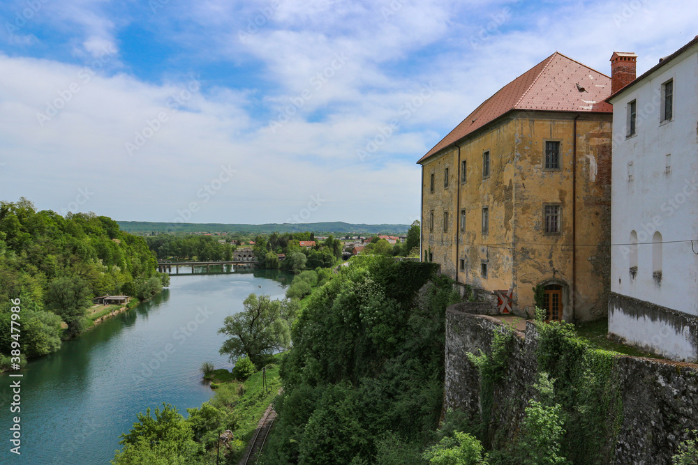 Slunj/ Croatia-August 8th, 2018: Beautiful old castle, towering above Korana river, surrounded by green forest near the city of Karlovac