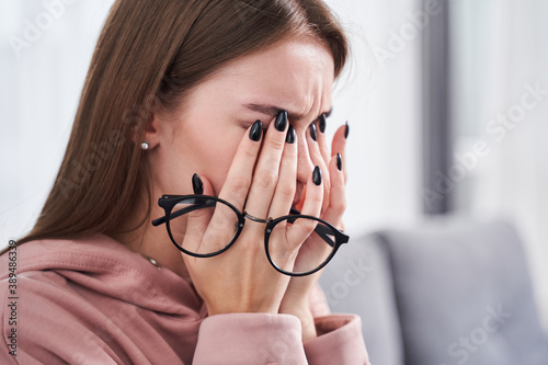 Fotografia, Obraz Woman rubbing dry irritated eyes