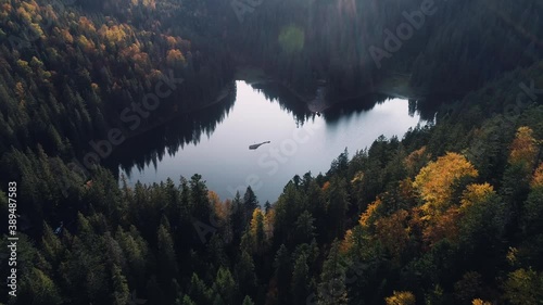 Aerial view: Cinematic shot of colorful autumn over Lake Synevyr in Carpathian mountains. Ukraine beauty nature. Travel. 4K photo