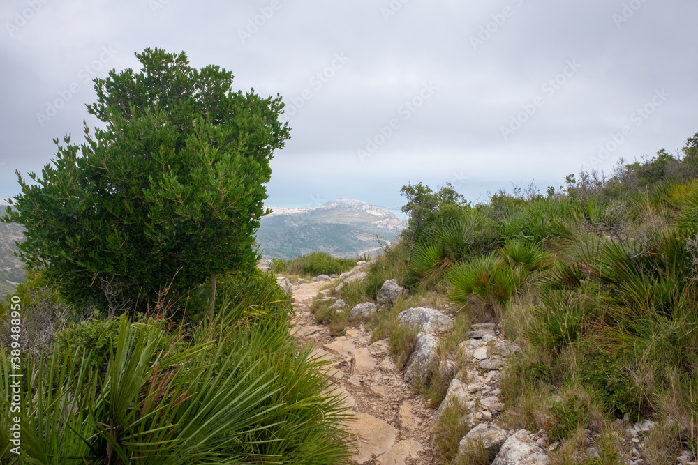 Mountain landscape of the Sierra de Irta in late summer. Hiking trails for walking Mountain landscape of the Sierra de Irta in late summer. Hiking trails for walking