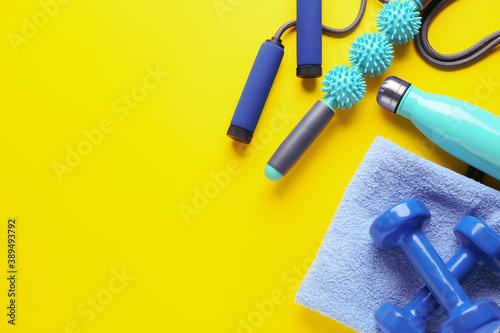 Sports equipment with body roller on color background