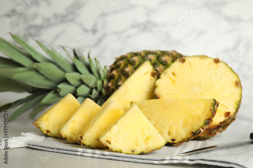 Slices of fresh juicy pineapple on table