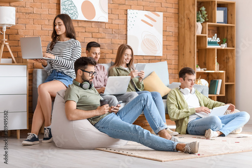 Students with modern device...