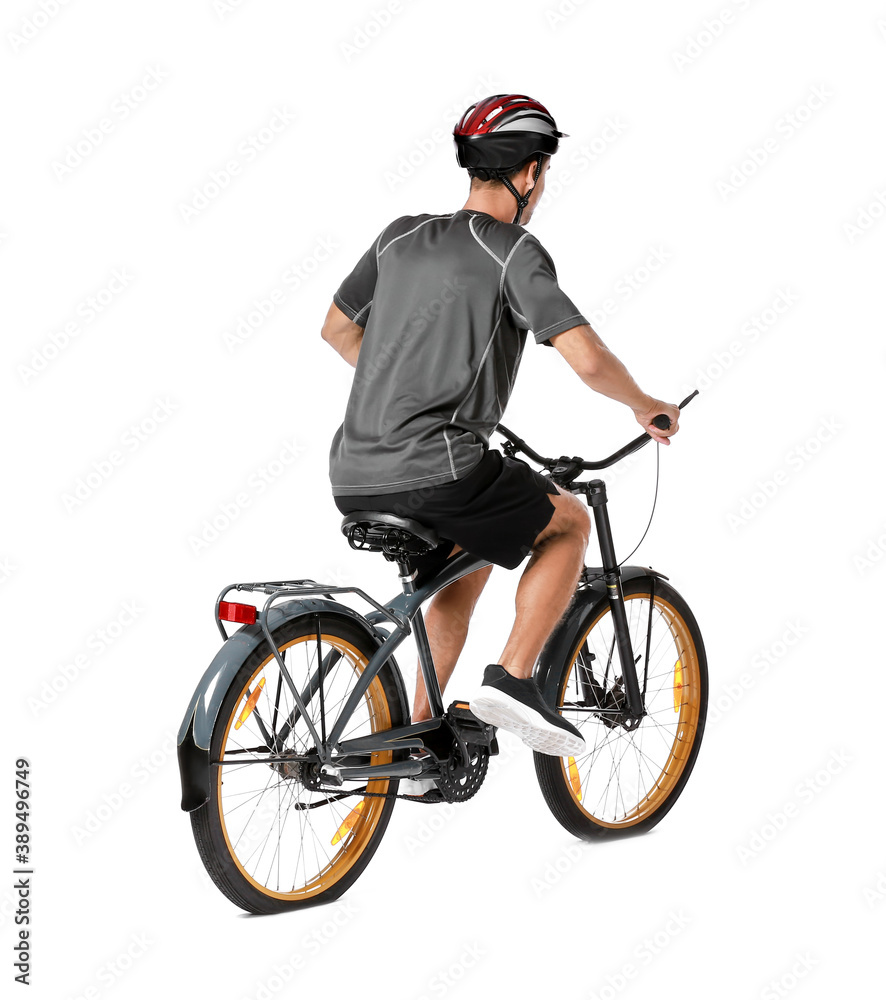 Male cyclist riding bicycle on white background Male cyclist riding bicycle on white background