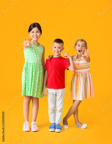 Little children with painte...