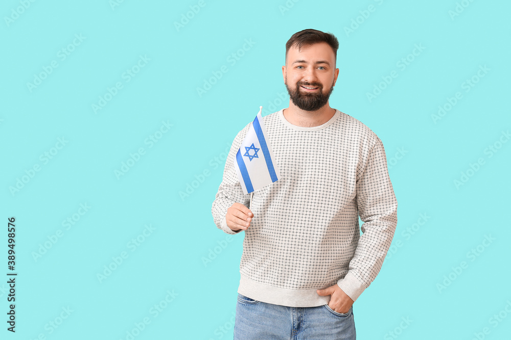 Man with the flag of Israel on color background Man with the flag of Israel on color background
