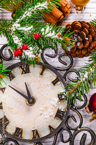 New Year Clock shows the time 5 minutes before the New year. Concept Background of Countdown to Celebrate New Year. Selective focus.