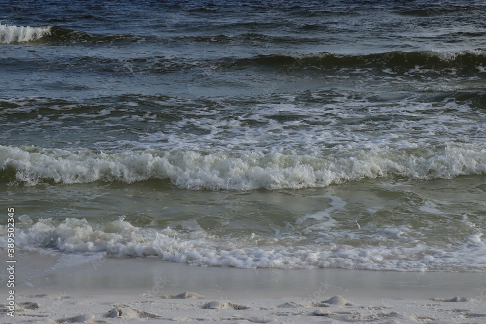 Coastal wave splashing on the shore, ocean view from the Gulf Coast