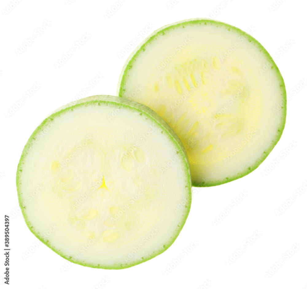 Slices of ripe zucchini on white background, top view