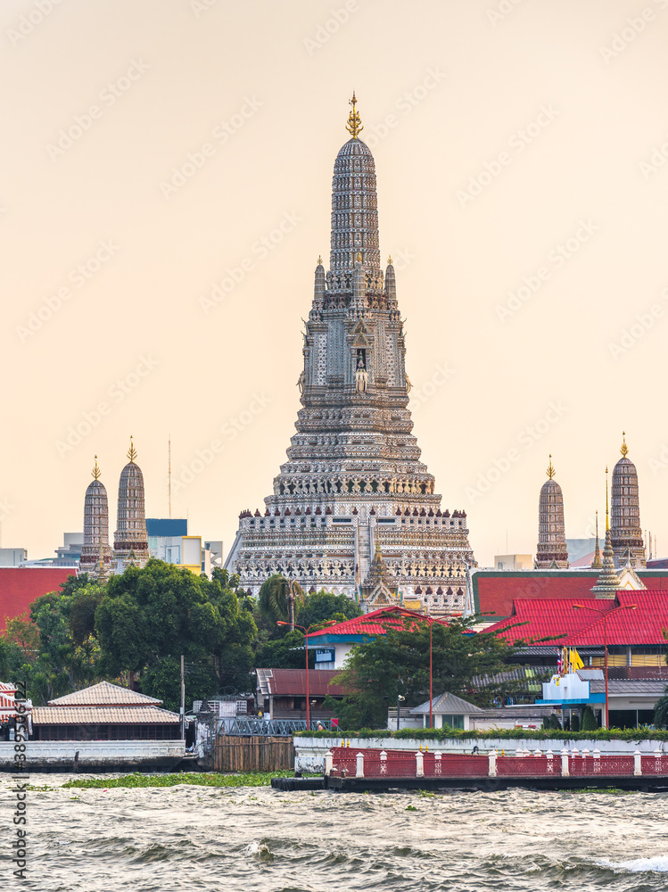 Chao Phraya River and Wat Arun, The Temple of Dawn, an Important Buddhist Temple and a Famous Tourist Destination in Bangkok Yai District of Bangkok, Thailand.