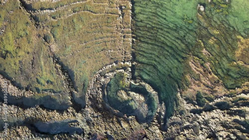 Cinematic aerial bird's eye view of tidepools at low tide in San Pedro, California Cinematic aerial bird's eye view of tidepools at low tide in San Pedro, California
