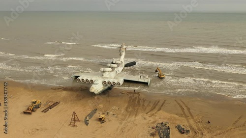 Lun-class ekranoplan, a formerly top-secret Soviet naval vessel. Giant flying ship on the coast of the Caspian Sea. Russia, Dagestan. photo