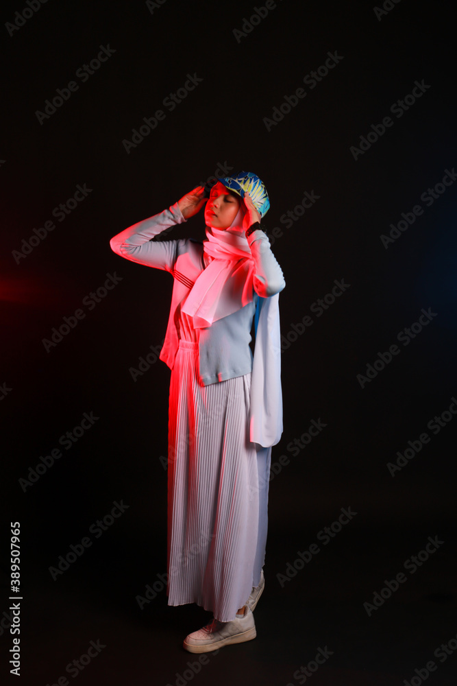 Fashion portrait of young beautiful asian muslim woman with wearing hijab.