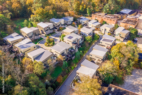 Aerial view of contemporary, modern duplex multistory houses, in a regentrified neighborhood, with young urban feel in the USA