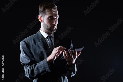 Man with tablet in hand. Ma...